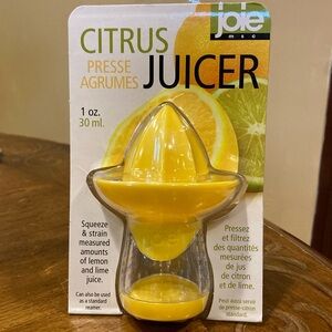 Joie citrus juicer. BPA free and dishwasher safe. Measurements on side. NIP.